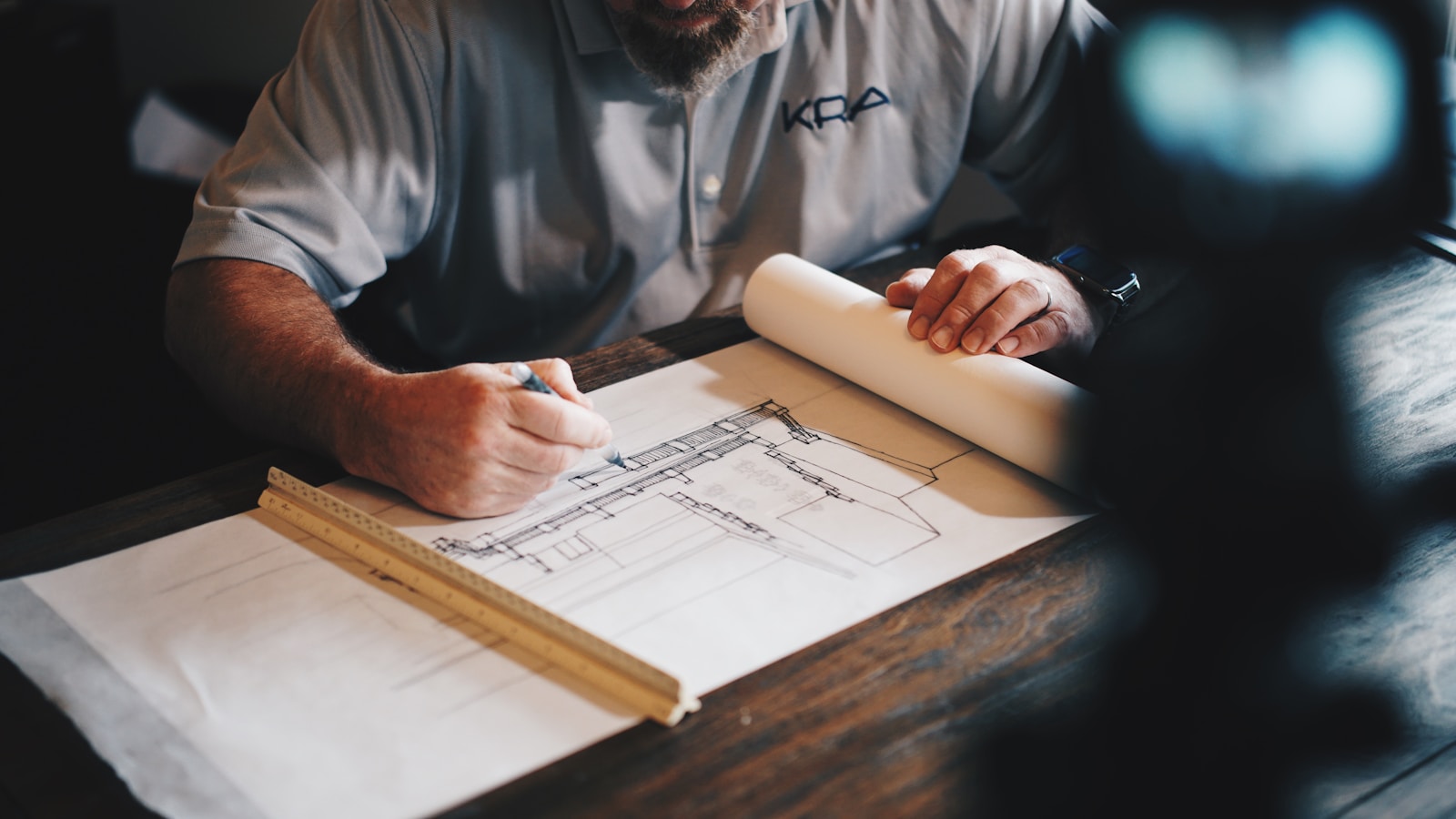 Architect reviewing plans of a residential building